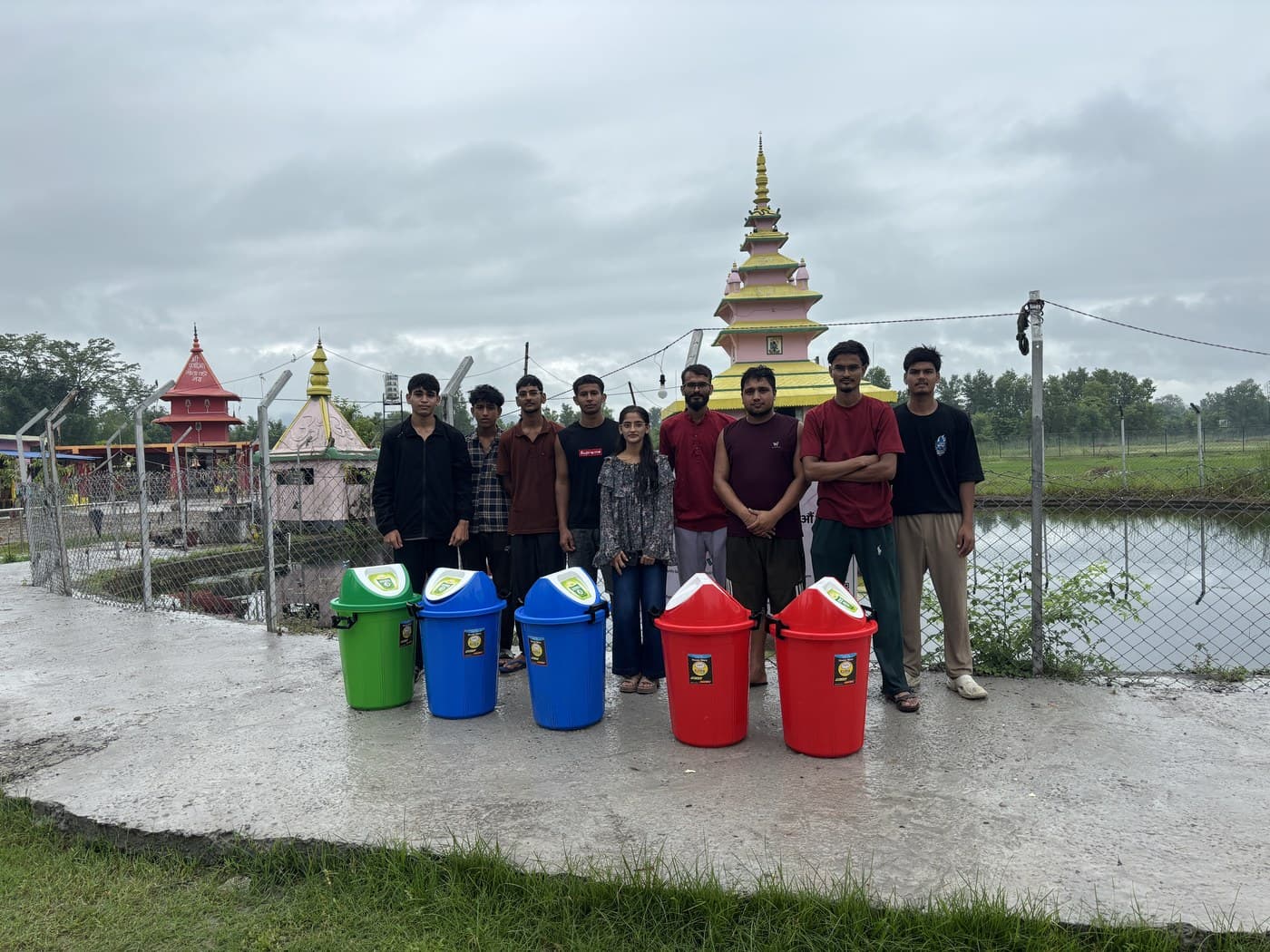 Back at Bhamkeswar Mandir: dustbins, a changing room, and a clean pond